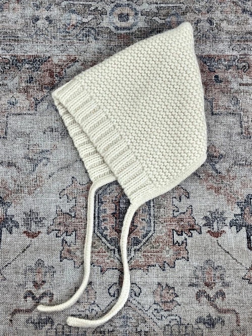 Hanna Andersson 
Soft Baby Alpaca Gnome hat
Knit Bonnet in Cream Baby Medium